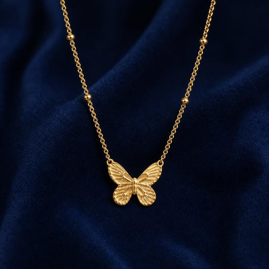 AYNOHA gold butterfly pendant necklace - studio