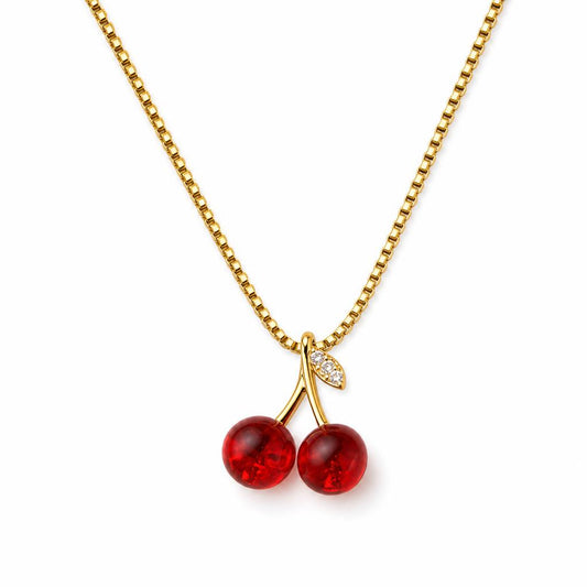 AYNOHA gold cherries necklace on white - studio