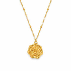 AYNOHA gold floral medallion necklace on white - studio